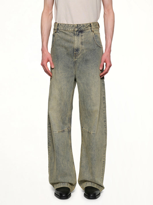 Image of a model wearing Denim. Productname: ENTIRE STUDIOS Gem Jeans in SURFACEWAVE colour by brand - ENTIRE STUDIOS