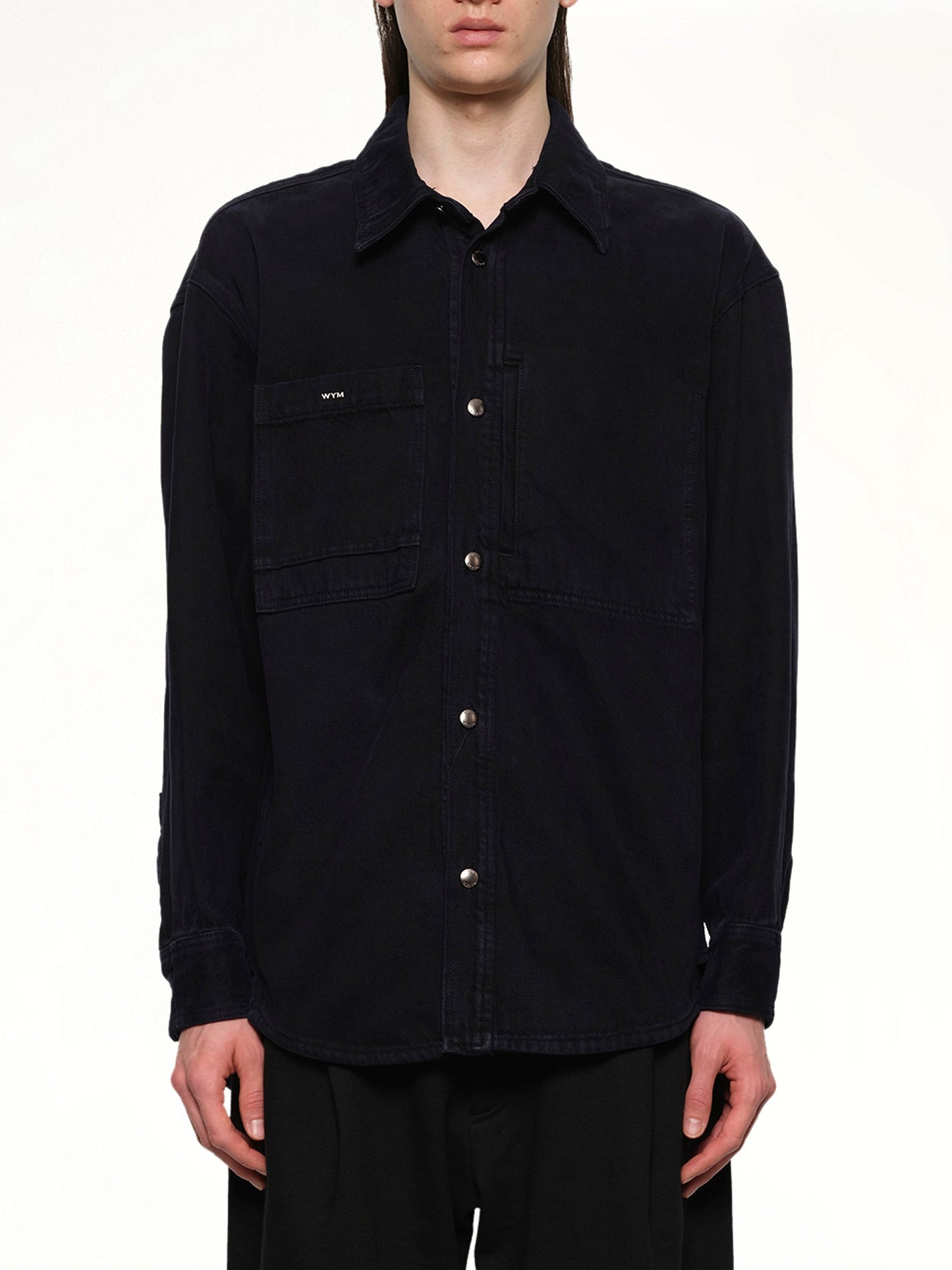 Image of a model wearing Denim. Productname: WOOYOUNGMI Logo Denim Shirt in NAVY colour by brand - WOOYOUNGMI