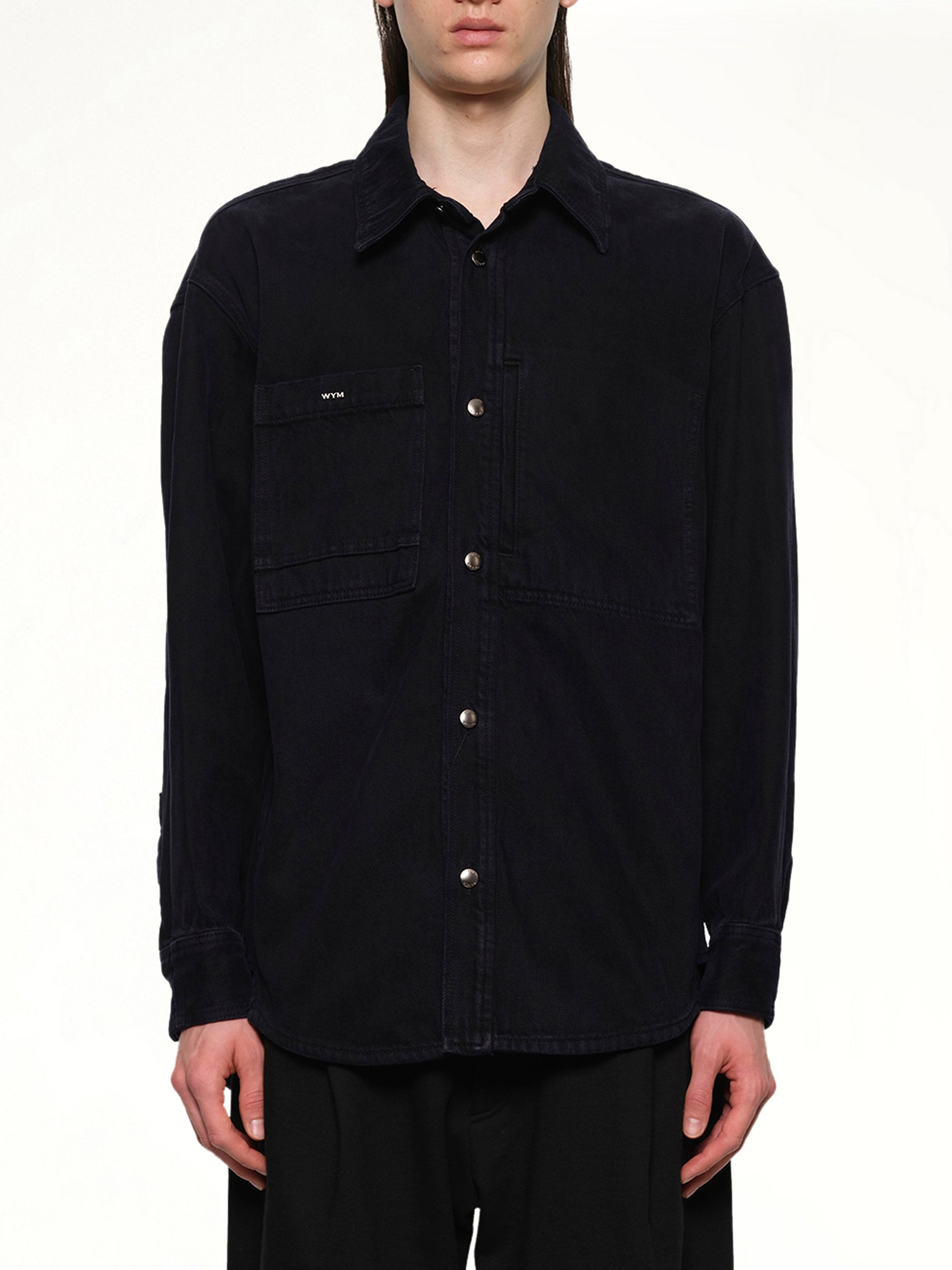 Image of a model wearing Denim. Productname: WOOYOUNGMI Logo Denim Shirt in NAVY colour by brand - WOOYOUNGMI