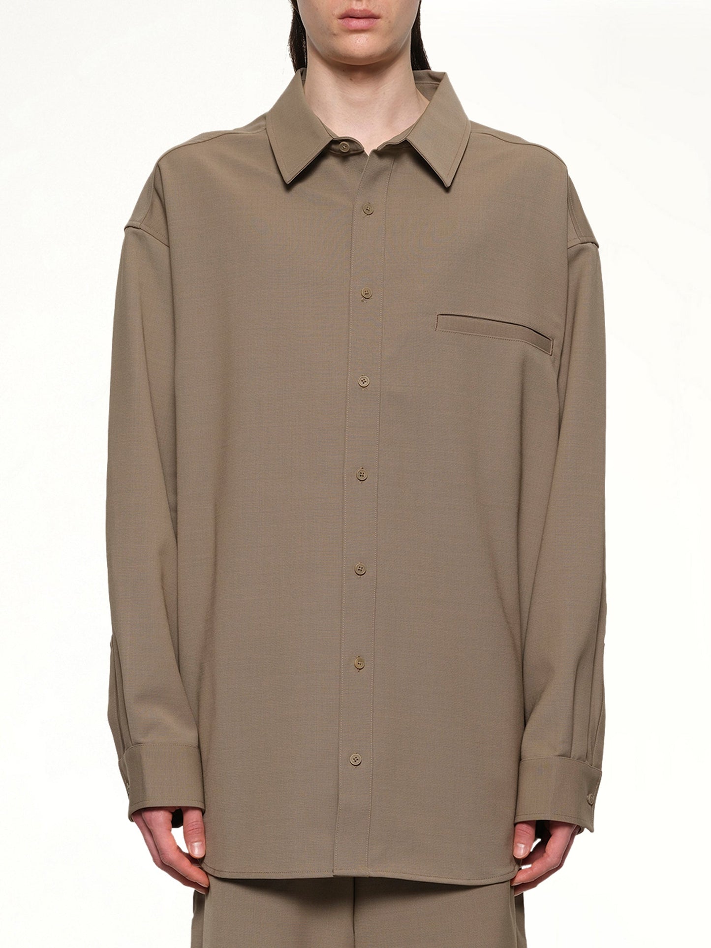 Image of a model wearing Tops. Productname: ENTIRE STUDIOS Giant Shirt in HILLS colour by brand - ENTIRE STUDIOS