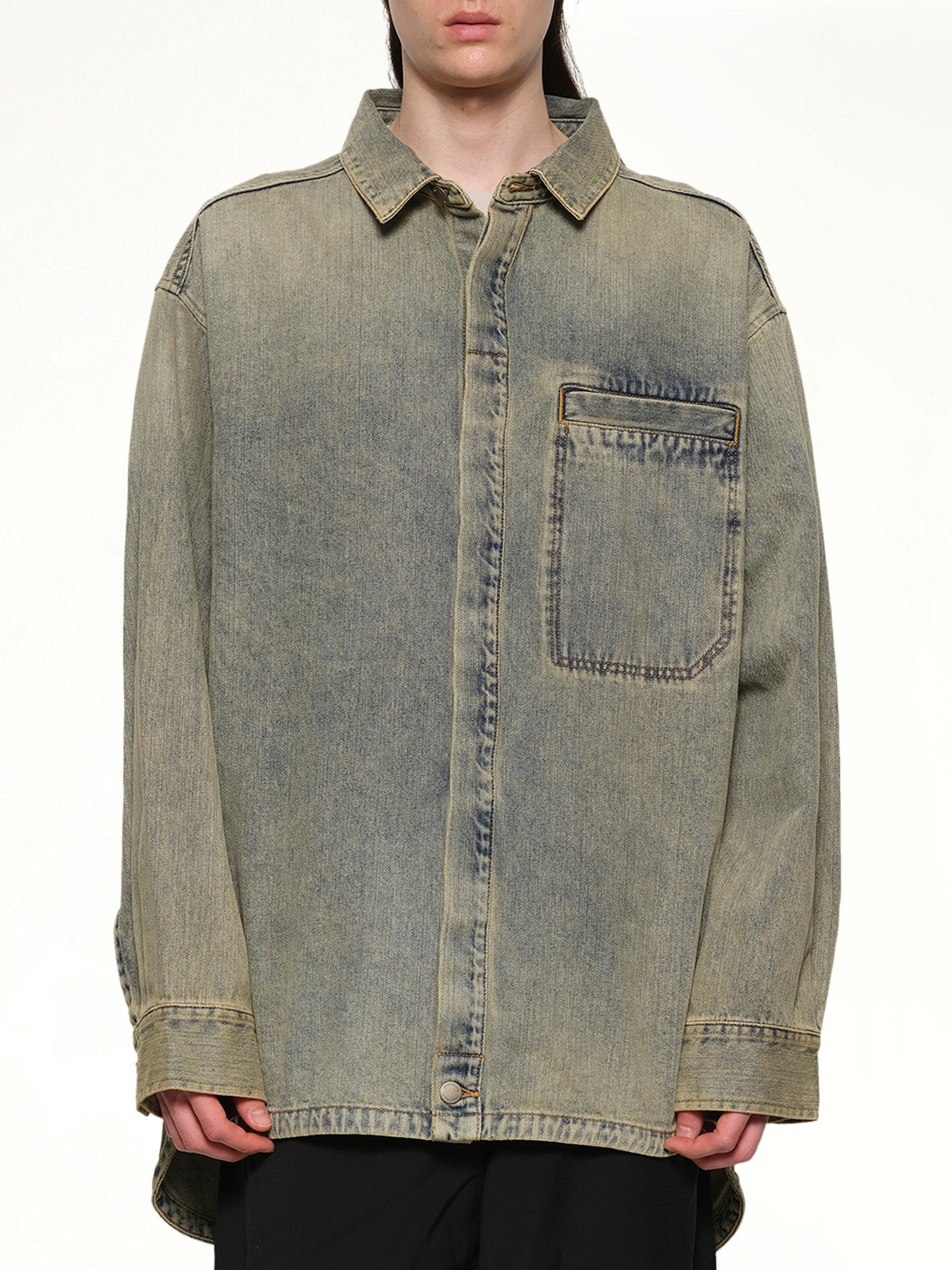 Image of a model wearing Denim. Productname: ENTIRE STUDIOS Herculean Shirt in SURFACEWAVE colour by brand - ENTIRE STUDIOS