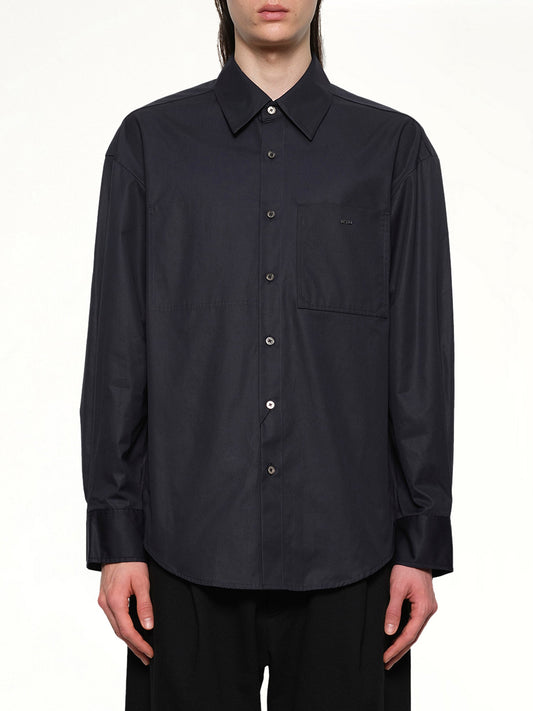 Image of a model wearing Tops. Productname: WOOYOUNGMI Logo Button Up Shirt in NAVY colour by brand - WOOYOUNGMI