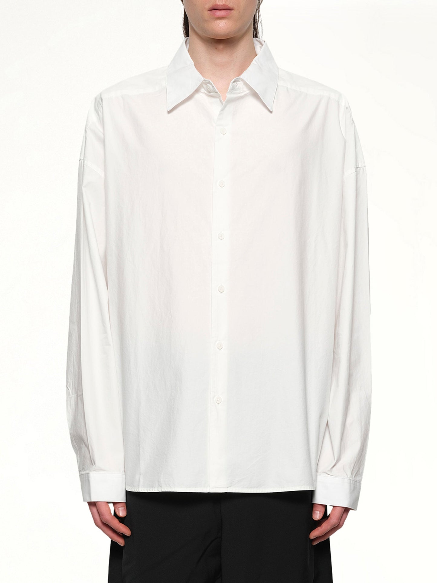 Image of a model wearing Tops. Productname: ENTIRE STUDIOS Miller Shirt in WHITE colour by brand - ENTIRE STUDIOS