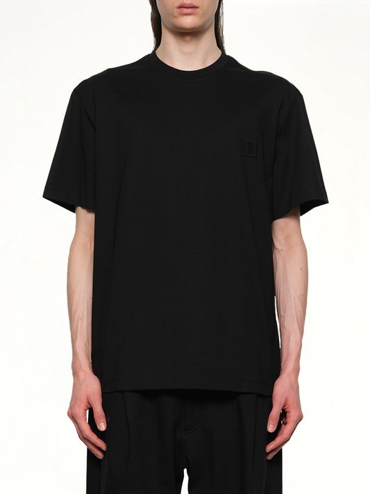 Image of a model wearing Tops. Productname: WOOYOUNGMI Flower Petal T-Shirt in BLACK colour by brand - WOOYOUNGMI