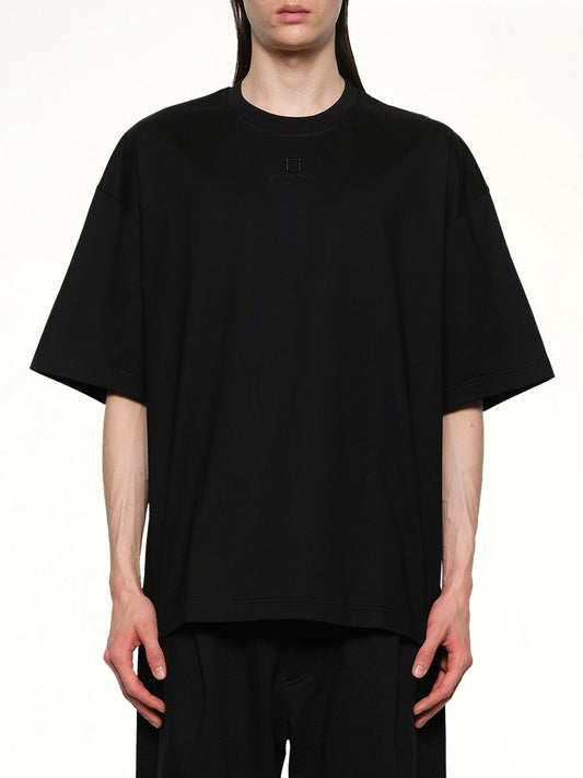 Image of a model wearing Tops. Productname: WOOYOUNGMI Square Embroidery T-Shirt in BLACK colour by brand - WOOYOUNGMI
