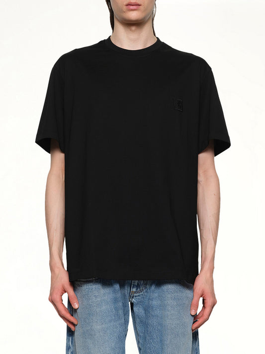 Image of a model wearing Tops. Productname: WOOYOUNGMI T-Shirt in BLACK colour by brand - WOOYOUNGMI