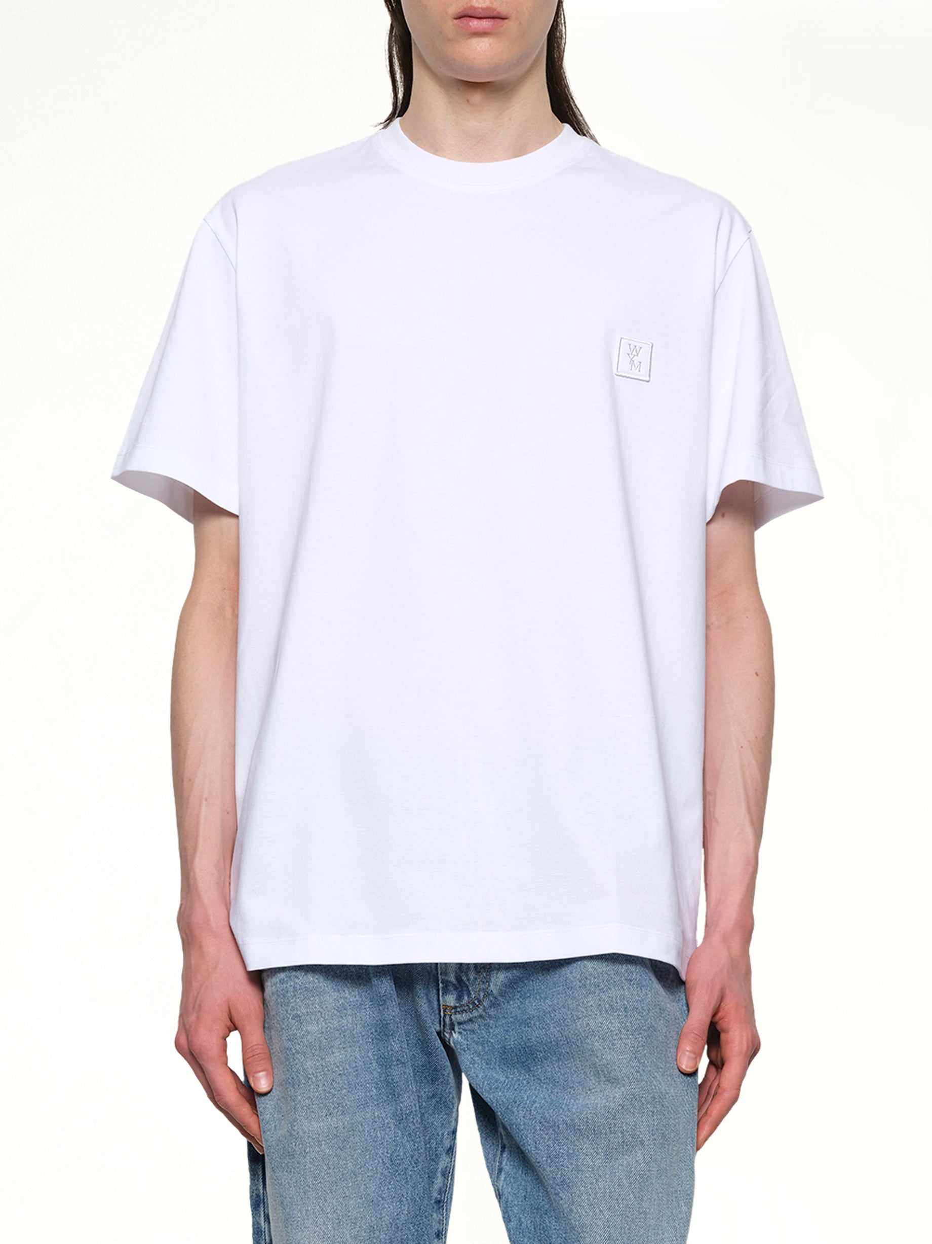 Image of a model wearing Tops. Productname: WOOYOUNGMI T-Shirt in WHITE colour by brand - WOOYOUNGMI