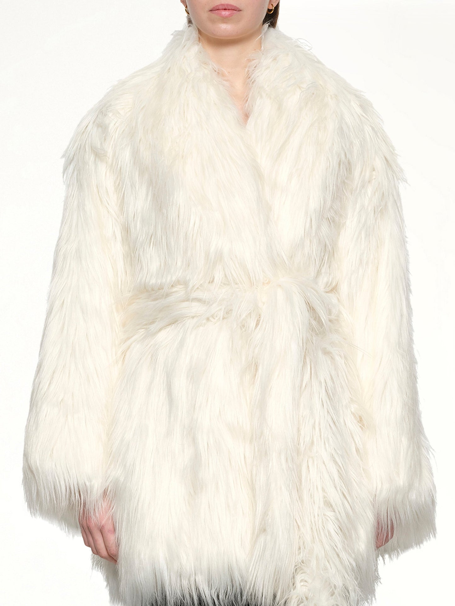 Image of a model wearing Outerwear. Productname: ENTIRE STUDIOS Juno Coat in CREAM colour by brand - ENTIRE STUDIOS