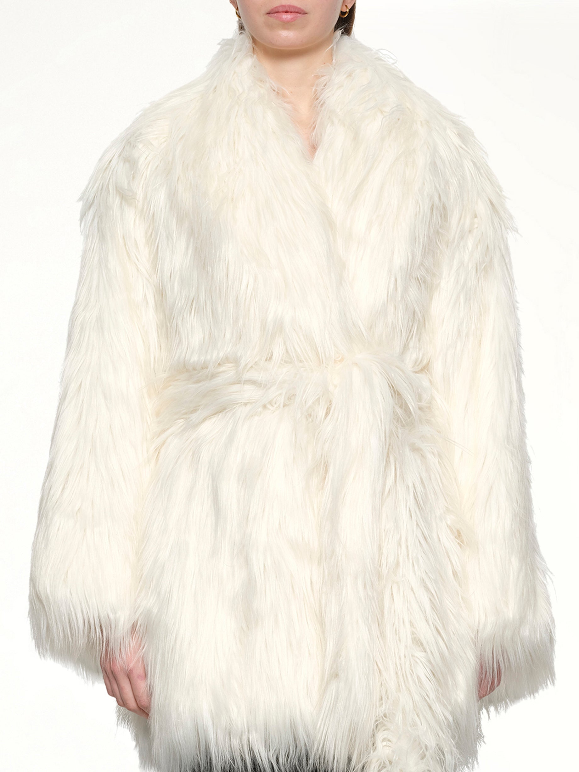 Image of a model wearing Outerwear. Productname: ENTIRE STUDIOS Juno Coat in CREAM colour by brand - ENTIRE STUDIOS