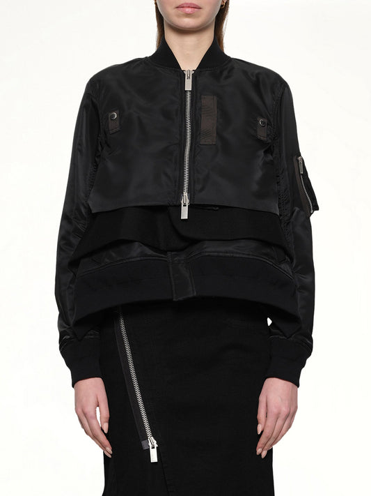 Image of a model wearing Outerwear. Productname: SACAI Nylon Twill x Wool Melton Blouson in Black colour by brand - SACAI