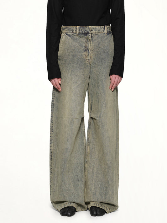 Image of a model wearing Denim. Productname: ENTIRE STUDIOS Dem Jeans in SURFACEWAVE colour by brand - ENTIRE STUDIOS