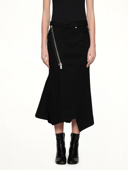 Image of a model wearing Skirts. Productname: SACAI Side Zip Denim Skirt in Black colour by brand - SACAI