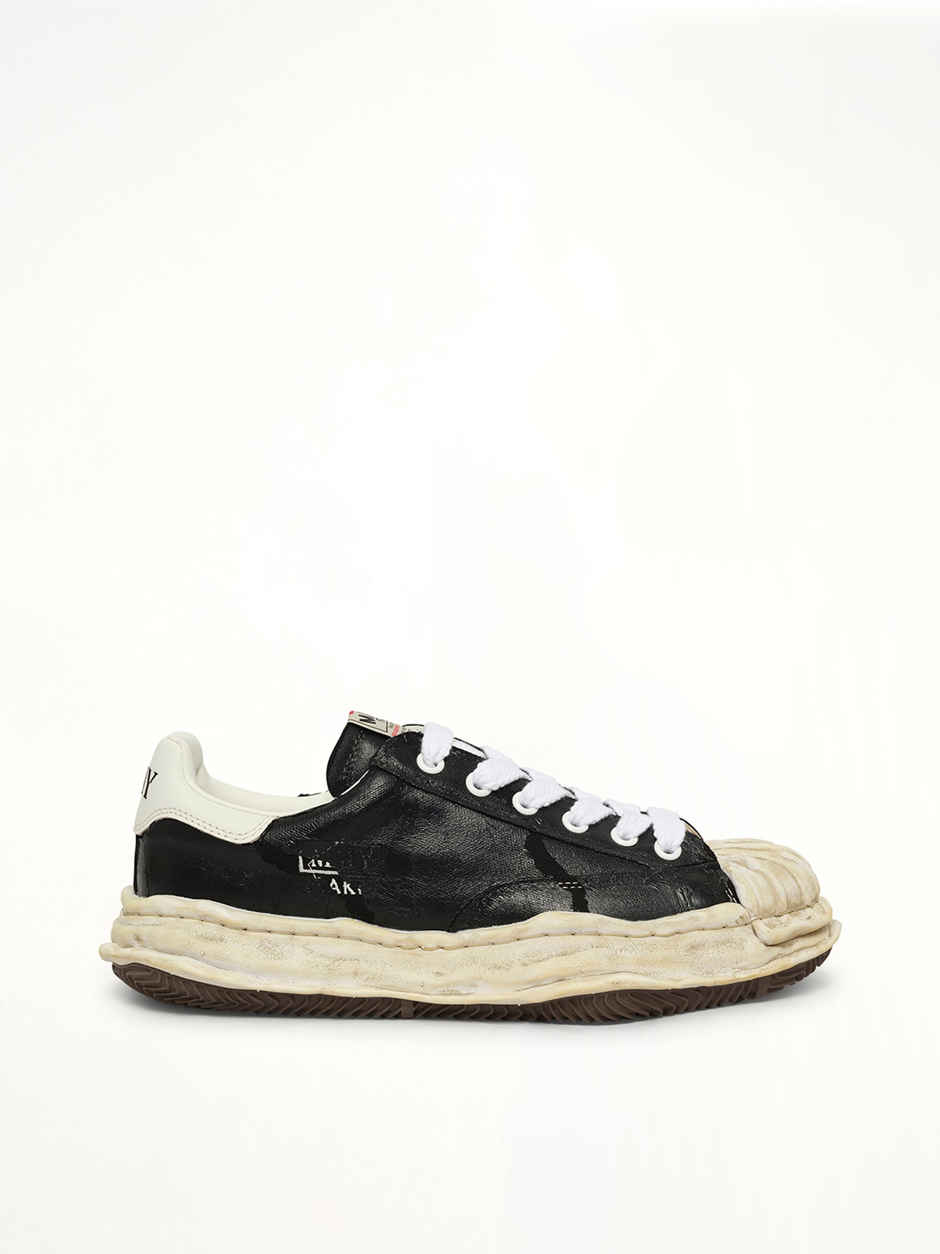 Image of Sneakers. Product name - Blakey OG Torn Sneaker in Black colour by brand - MAISON MIHARA YASUHIRO