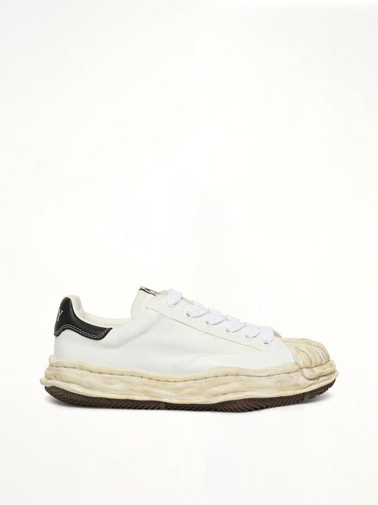 Image of Sneakers. Product name - Blakey OG Torn Sneaker in White colour by brand - MAISON MIHARA YASUHIRO
