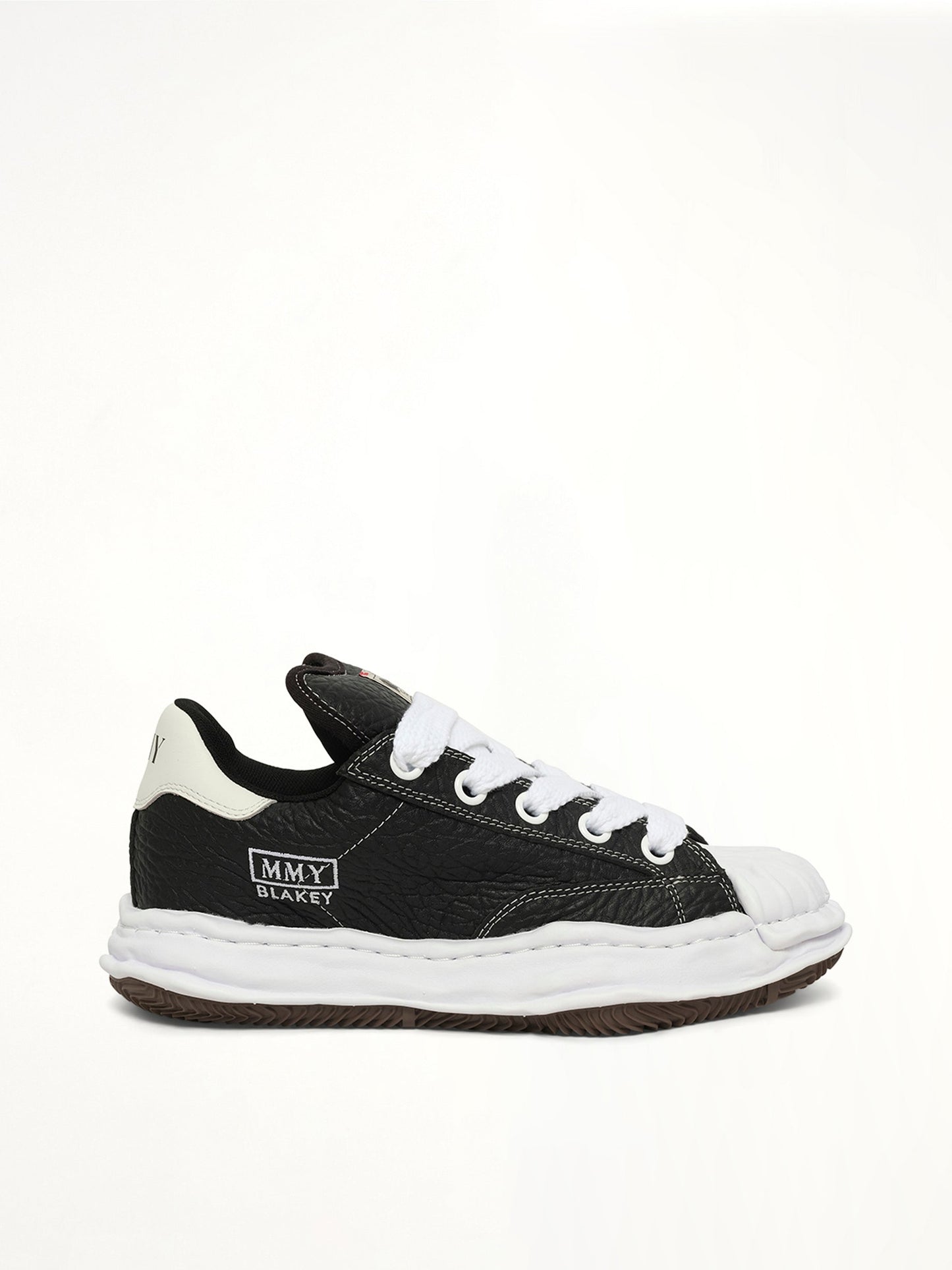 Image of Sneakers. Product name - Blakey Puffer OG Sneaker in Black colour by brand - MAISON MIHARA YASUHIRO