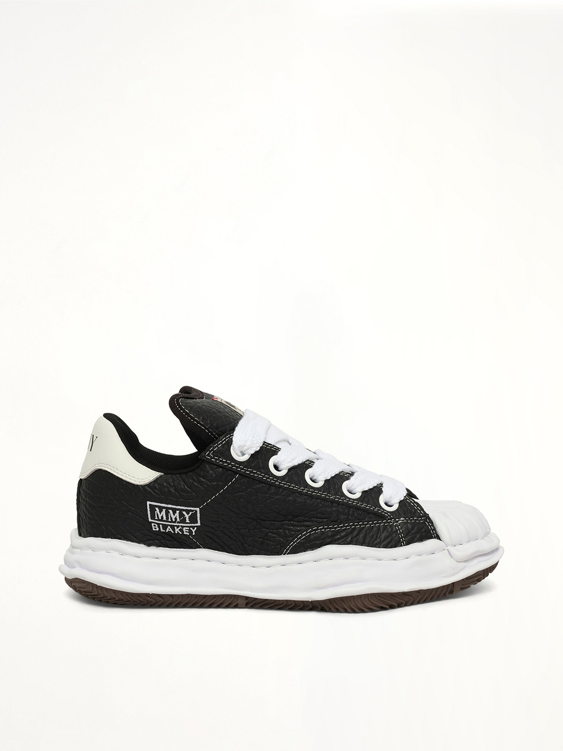 Image of Sneakers. Product name - Blakey Puffer OG Sneaker in Black colour by brand - MAISON MIHARA YASUHIRO