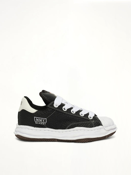 Image of Sneakers. Product name - Blakey Puffer OG Sneaker in Black colour by brand - MAISON MIHARA YASUHIRO