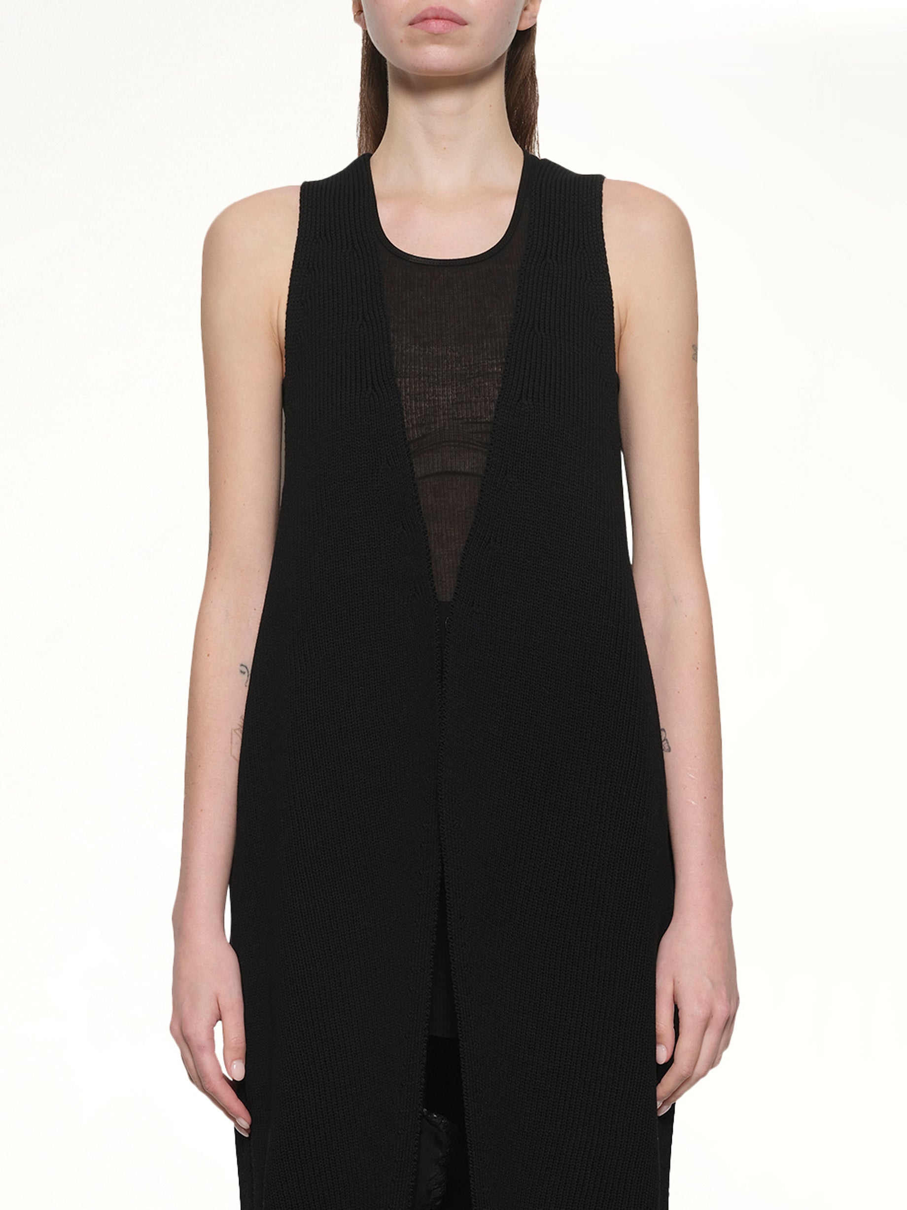 Image of a model wearing Outerwear. Productname: RICK OWENS SL Cyclops Coat in Black colour by brand - RICK OWENS