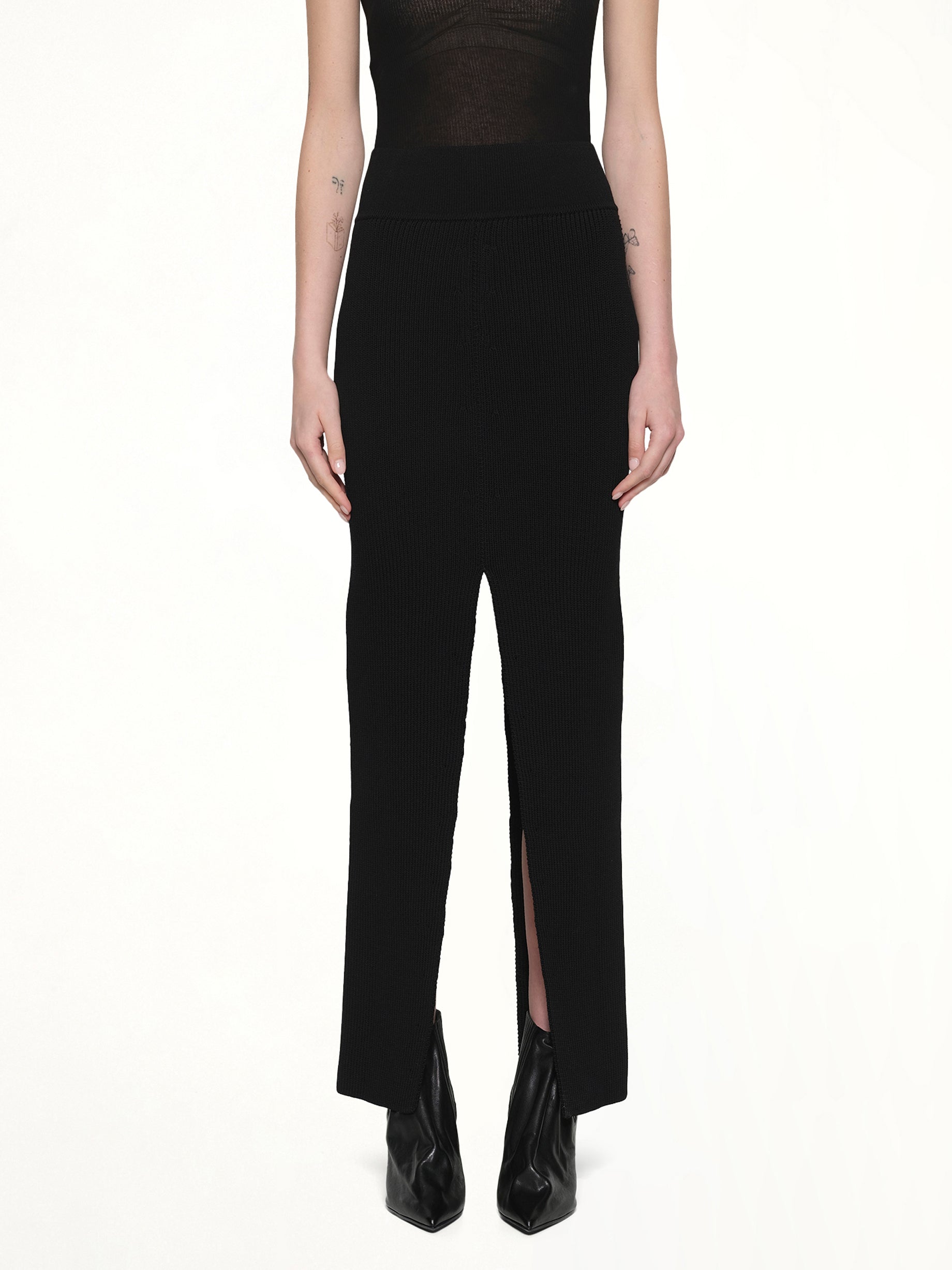 Image of a model wearing Shorts. Productname: RICK OWENS Short Sliced Skirt in Black colour by brand - RICK OWENS