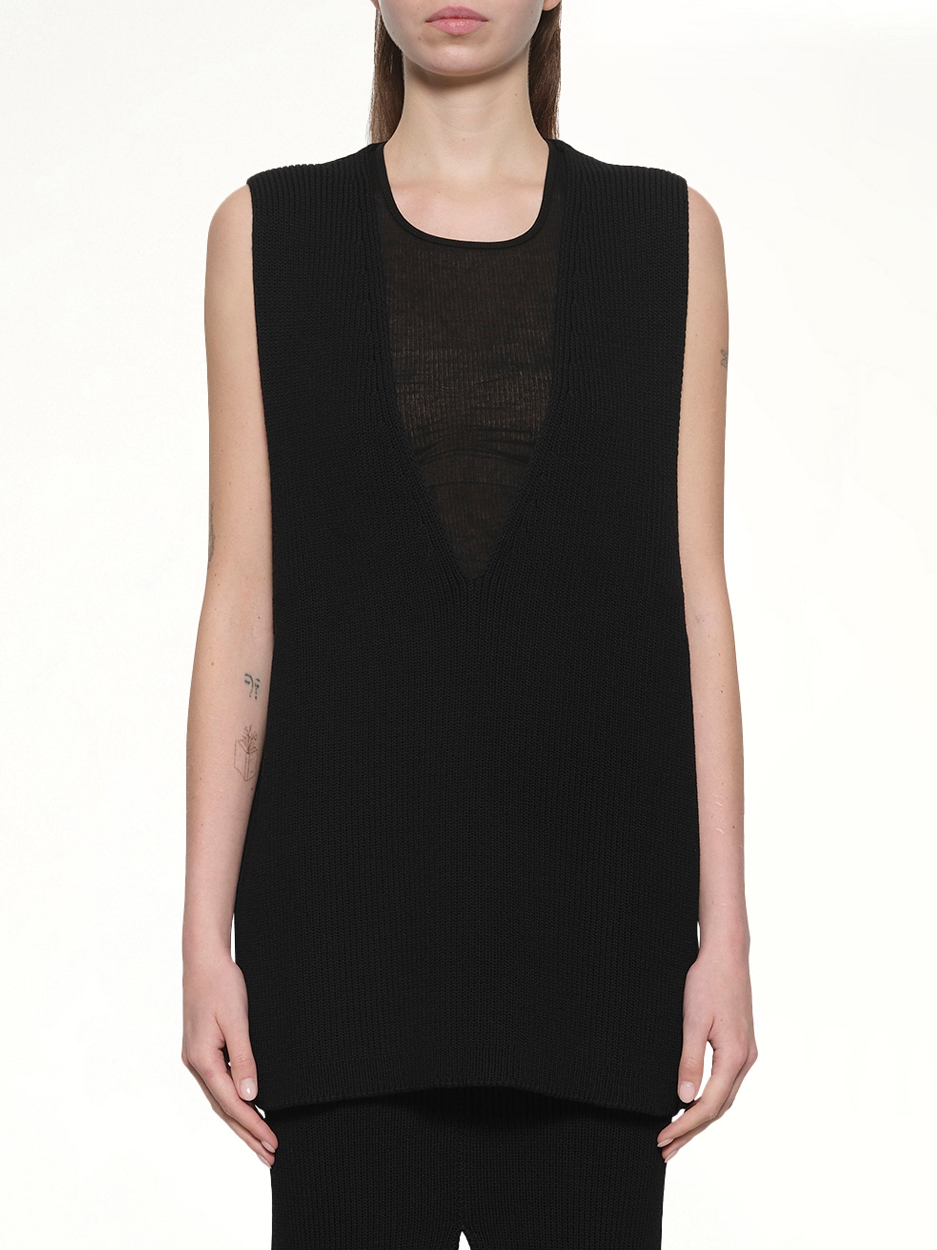Image of a model wearing Tops. Productname: RICK OWENS V Neck Top in Black colour by brand - RICK OWENS