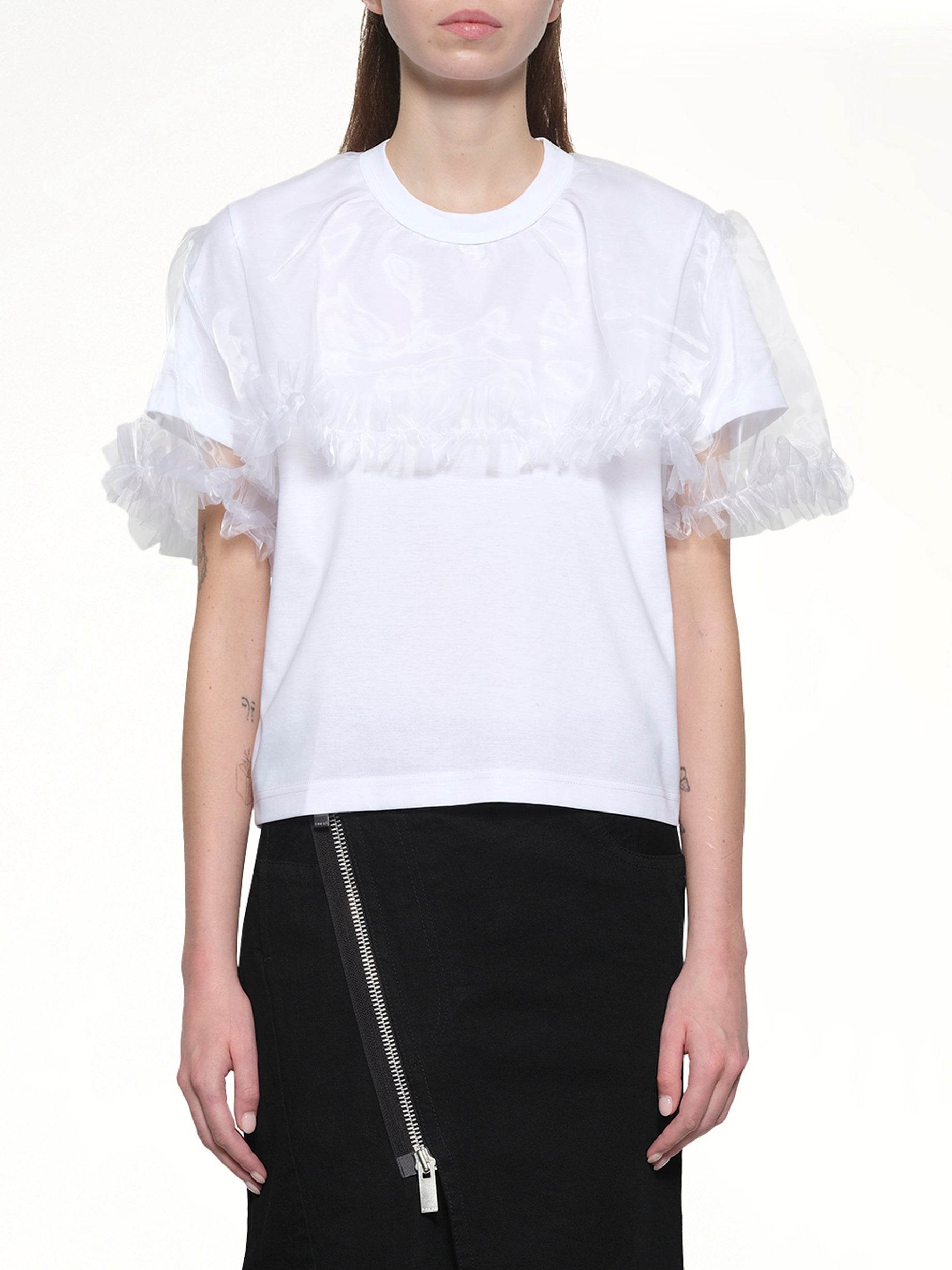 Image of a model wearing Tops. Productname: NOIR KEI NINOMIYA Tulle T-Shirt in White colour by brand - NOIR KEI NINOMIYA