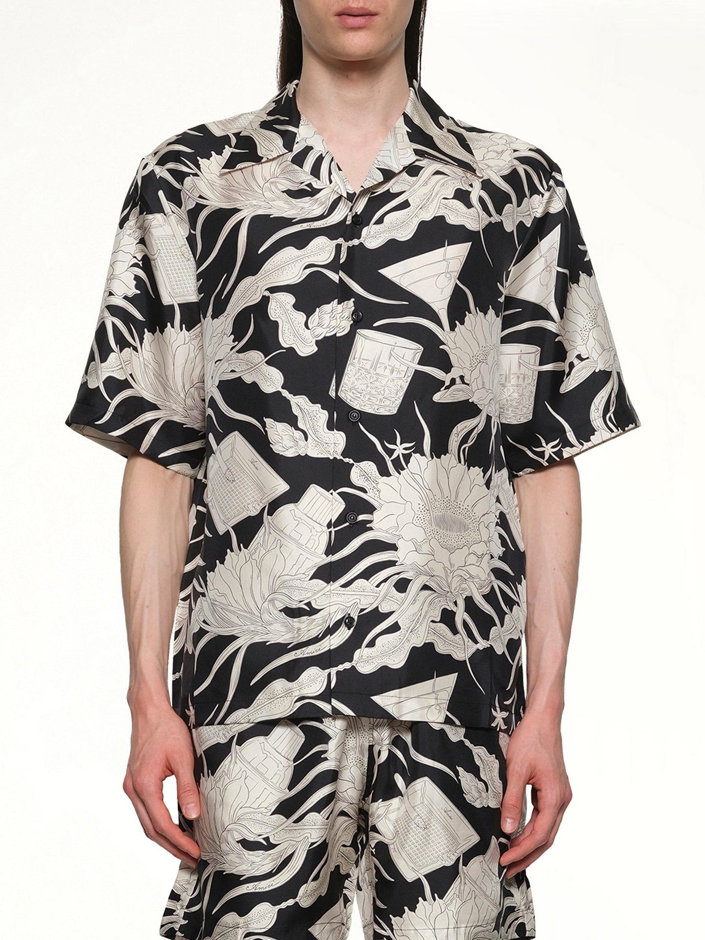 Image of a model wearing Tops. Productname: AMIRI Floral Bowling Shirt in BLACK colour by brand - AMIRI