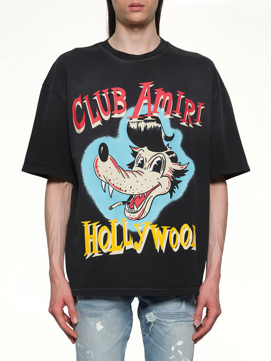 Image of a model wearing Tops. Productname: AMIRI Club Amiri Wolf Oversized Tee in BLACK colour by brand - AMIRI