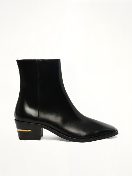 Image of Boots. Product name - MA Metallic Heel Boot in Black colour by brand - AMIRI