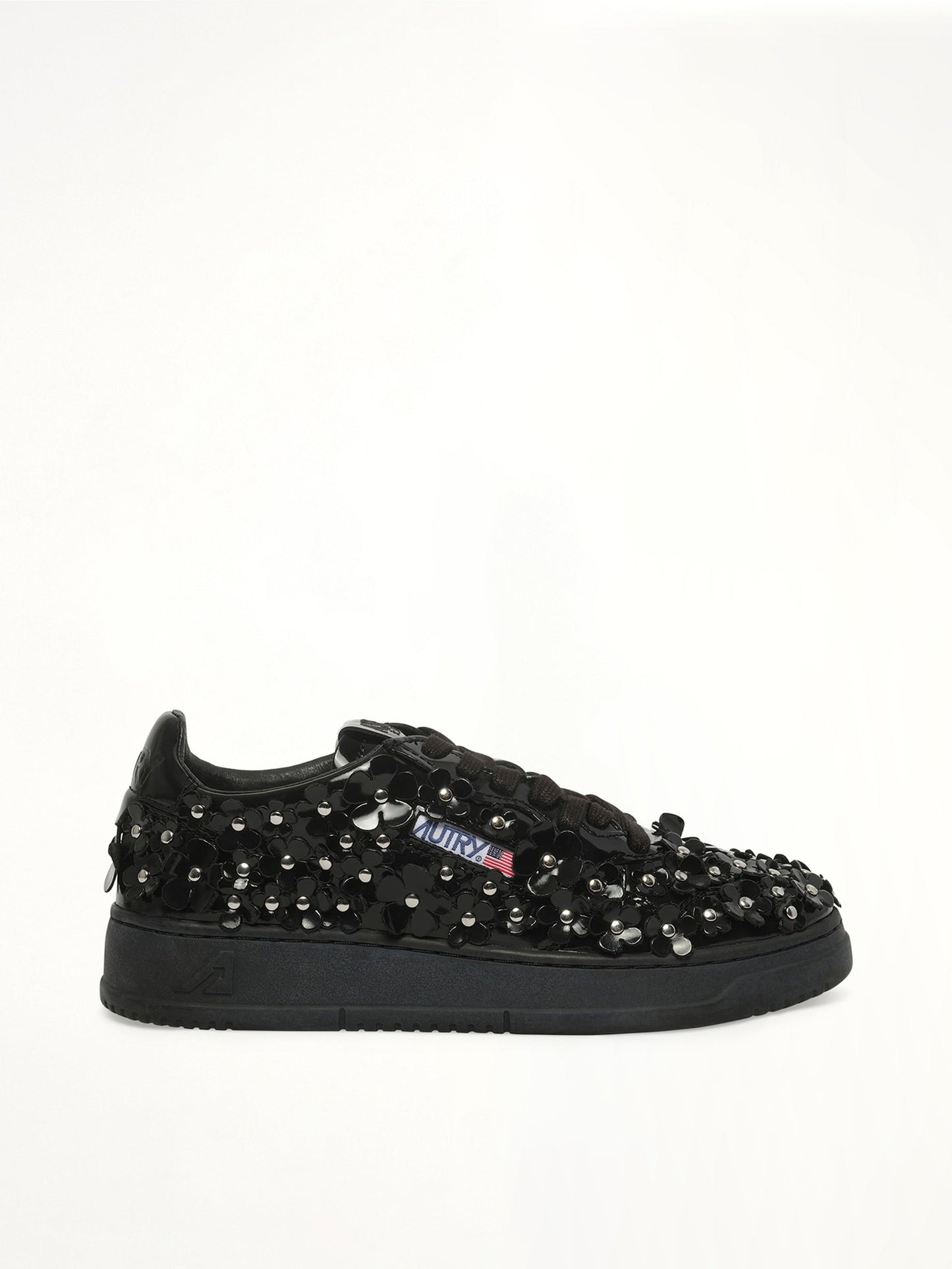 Image of Sneakers. Product name - Medalist Low Patent Flower Sneaker in Black colour by brand - AUTRY