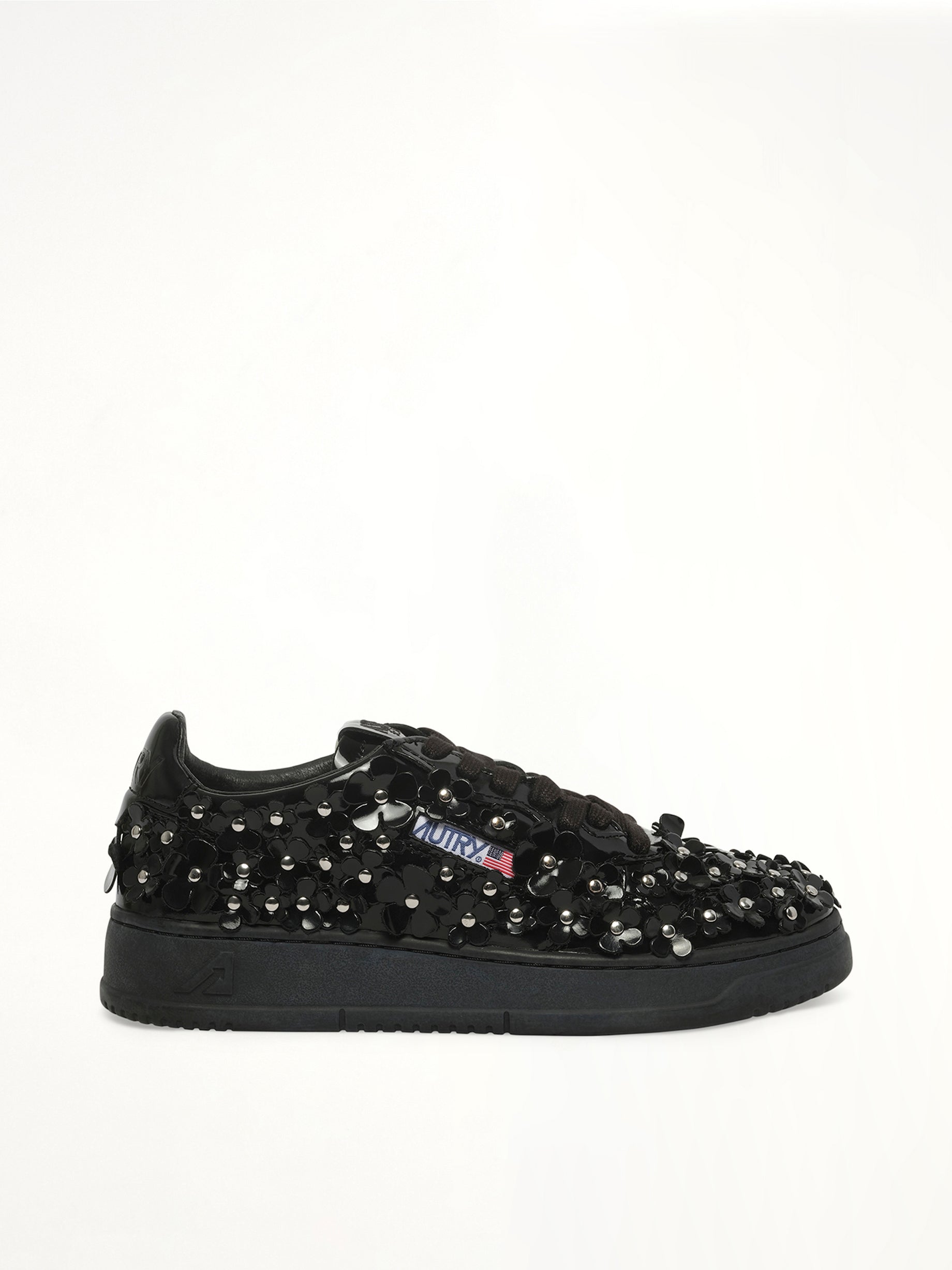 Image of Sneakers. Product name - Medalist Low Patent Flower Sneaker in Black colour by brand - AUTRY