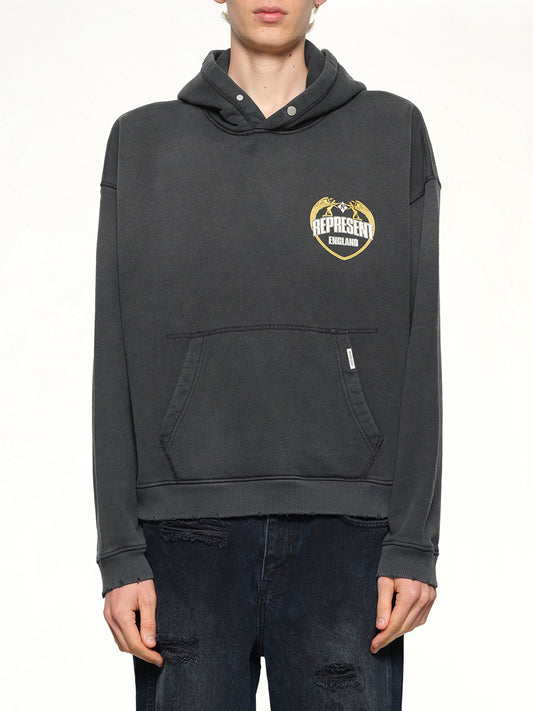 Image of a model wearing Outerwear. Product name - Represent Angel Border Hoodie in Stained Black colour by brand - REPRESENT