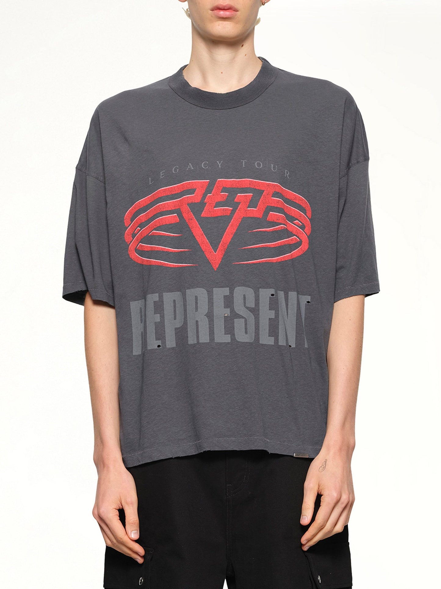 Image of a model wearing Tops. Productname: REPRESENT Reversible Living Legacy Falcon T-Shirt in Sun Fade Grey colour by brand - REPRESENT