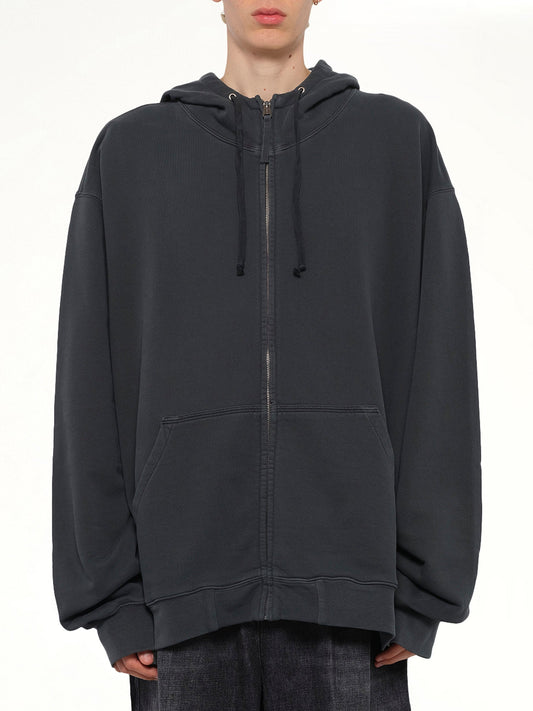 Image of a model wearing Outerwear. Product name - Lightweight Firm Zip Hoodie in Charcoal colour by brand - MAISON MARGIELA