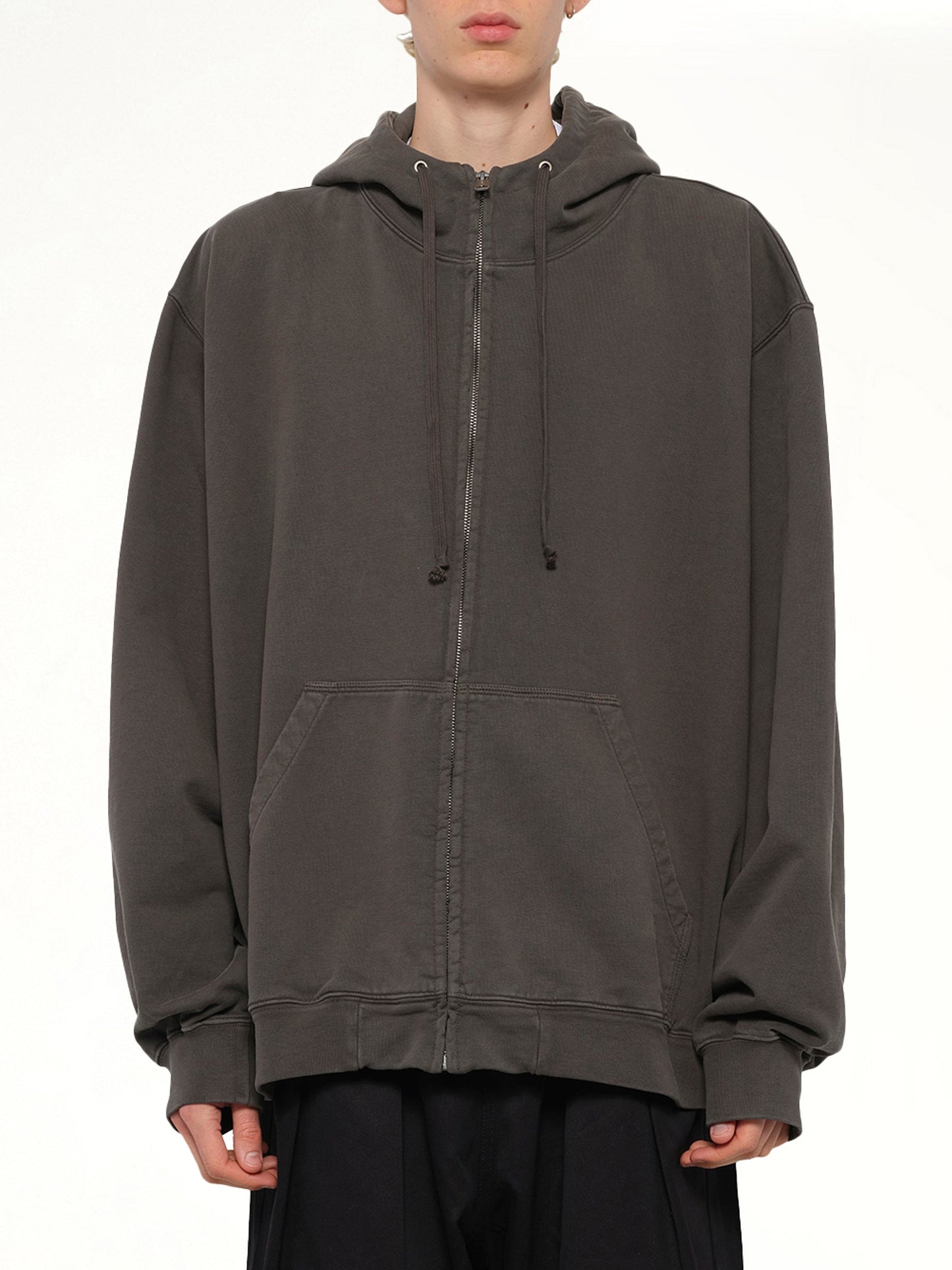 Image of a model wearing Outerwear. Product name - Zip Hoodie in Grey colour by brand - MAISON MARGIELA