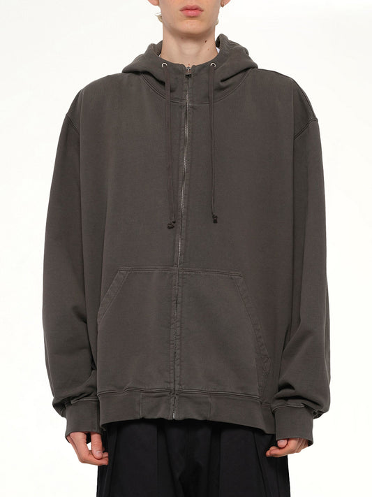 Image of a model wearing Outerwear. Product name - Zip Hoodie in Grey colour by brand - MAISON MARGIELA