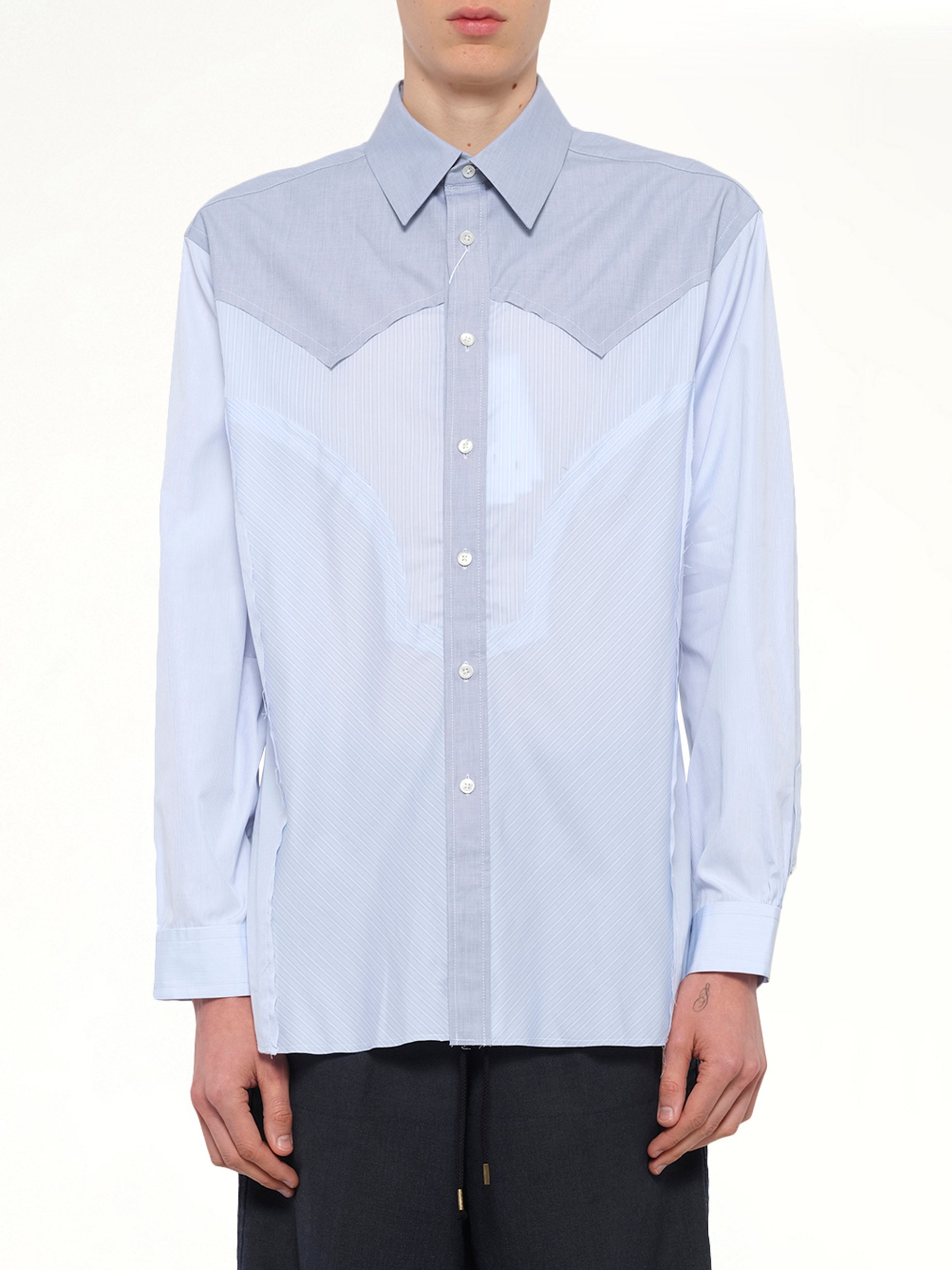 Image of a model wearing Tops. Productname: MAISON MARGIELA Classic Stripe Shirt in Azure colour by brand - MAISON MARGIELA