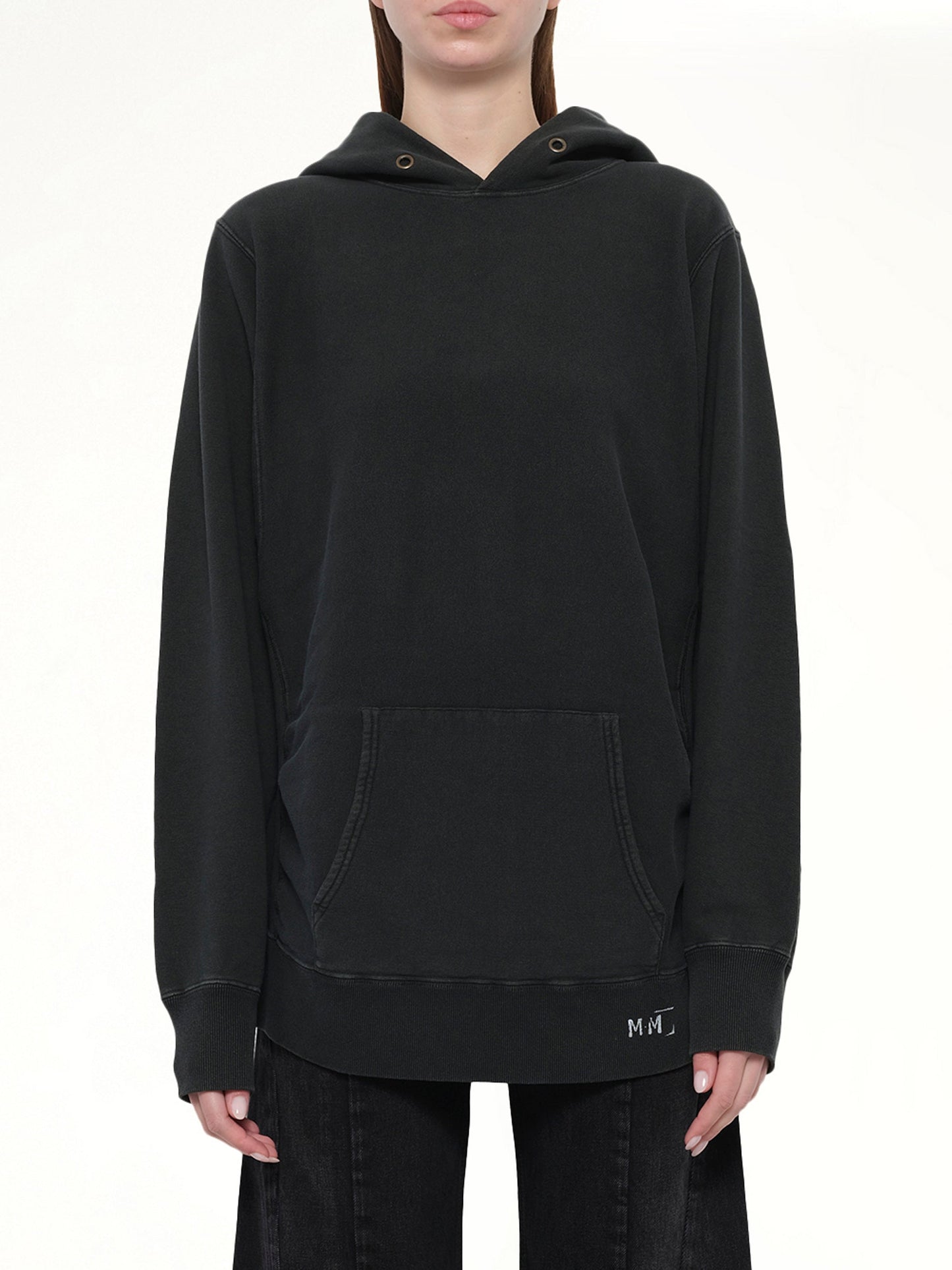Image of a model wearing Outerwear. Productname: MAISON MARGIELA Organic Cotton Fleece Hoodie in Vintage Carbon colour by brand - MAISON MARGIELA