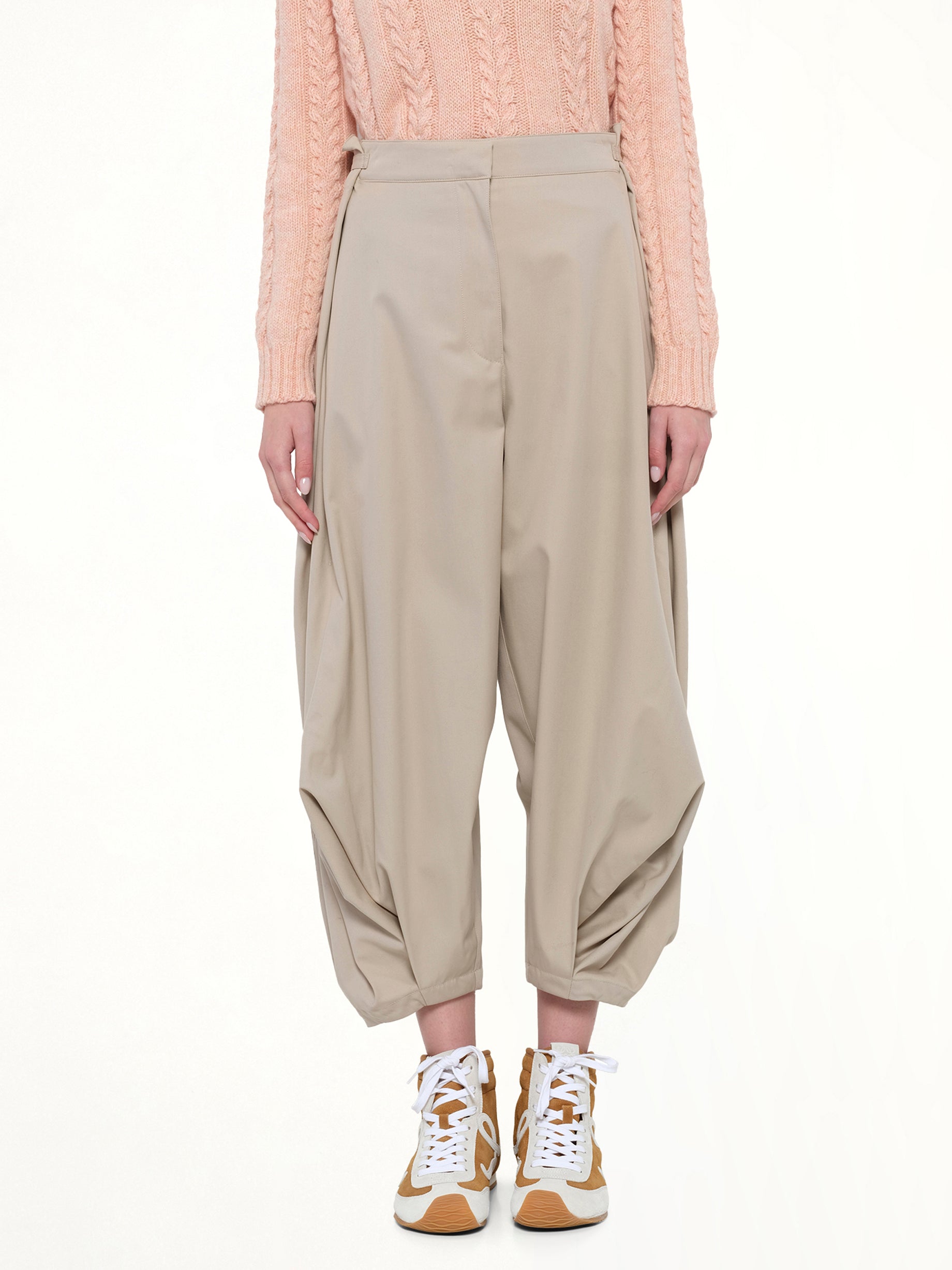 Image of a model wearing Pants. Productname: LOEWE Draped Trouser AF in Beige colour by brand - LOEWE
