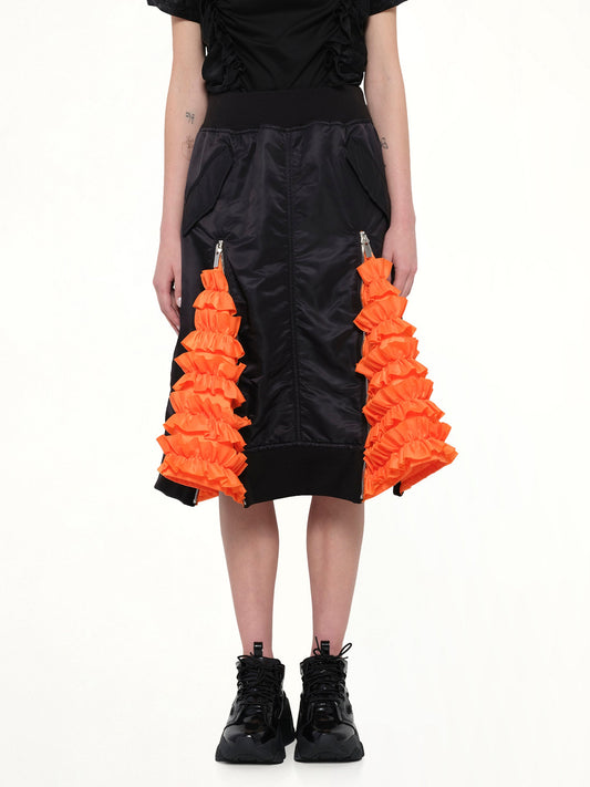 Image of a model wearing Skirts. Productname: NOIR KEI NINOMIYA Noir Kei Ninomiya Nylon Twill Skirt in Black colour by brand - NOIR KEI NINOMIYA