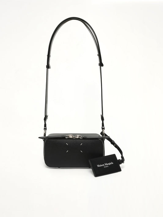 Image of Bags. Productname: MAISON MARGIELA Doll Small Camera Bag in Black colour by brand - MAISON MARGIELA