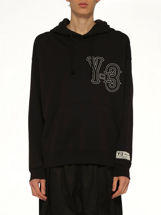 Image of a model wearing Outerwear. Product name - Elite 5 Graphics Hoodie in Black colour by brand - Y-3