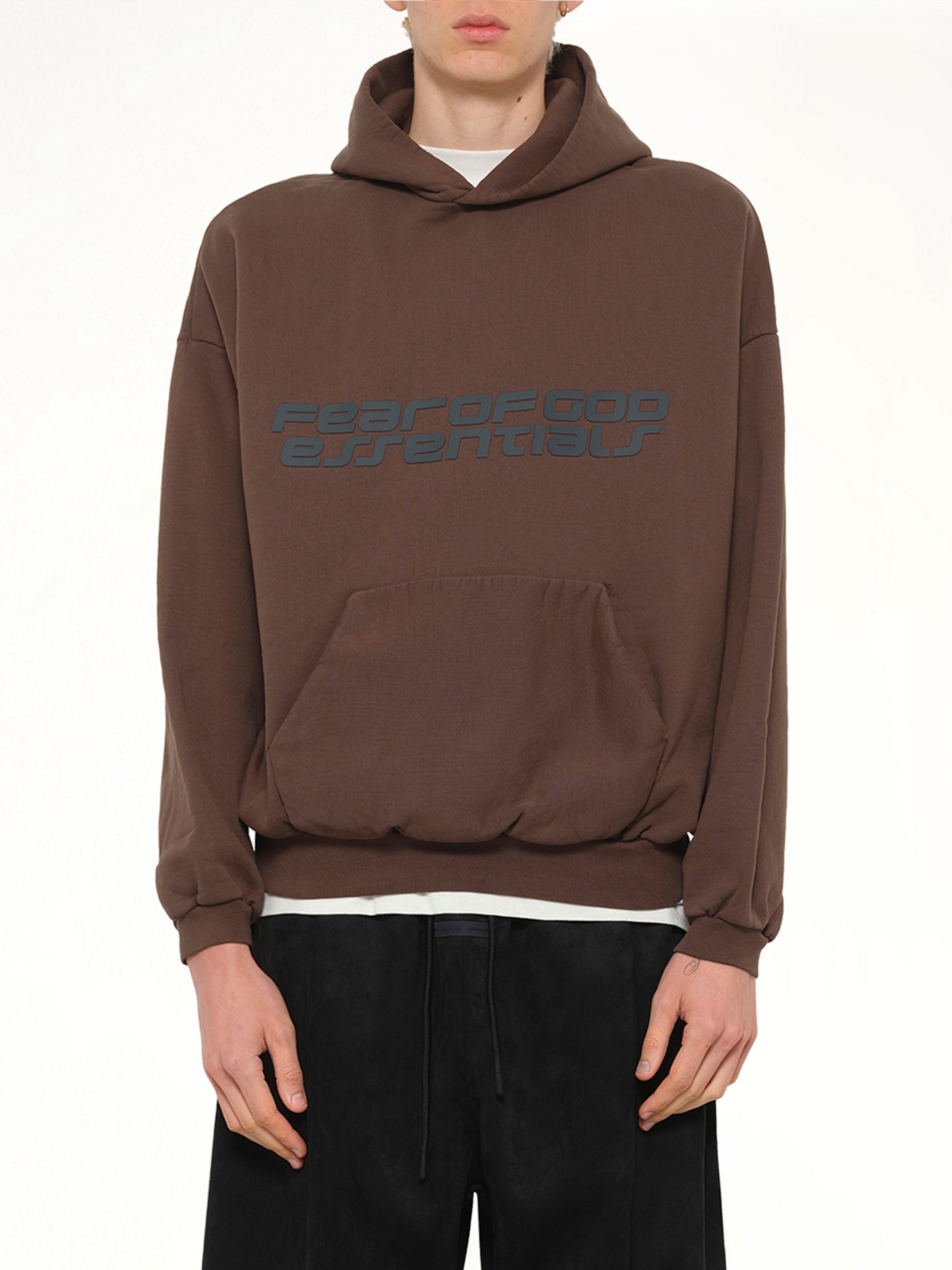 Image of a model wearing Outerwear. Product name - 90's Hoodie in Brown colour by brand - FEAR OF GOD ESSENTIALS