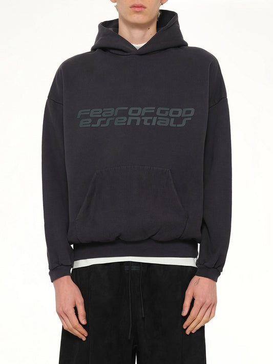 Image of a model wearing Outerwear. Product name - 90's Hoodie in Black colour by brand - FEAR OF GOD ESSENTIALS