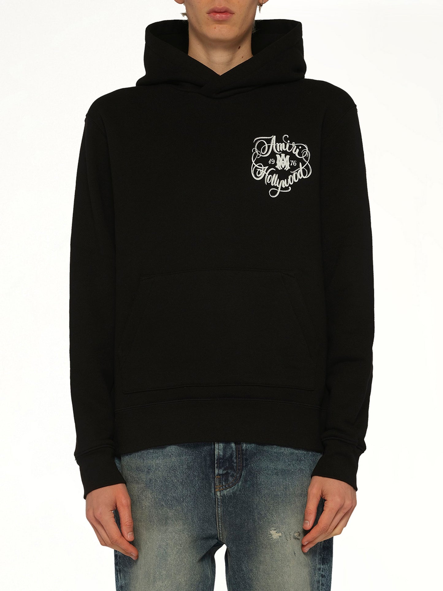 Image of a model wearing Outerwear. Product name - Amiri Hollywood Hoodie in Black colour by brand - AMIRI