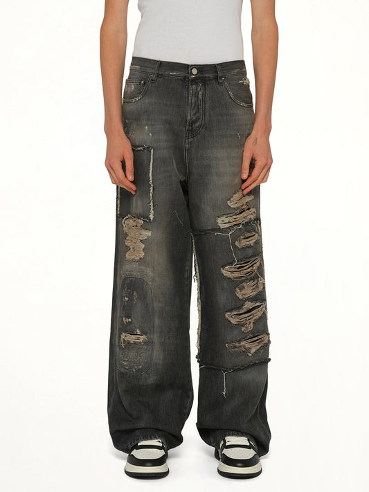 Image of Jeans. Product name - Carpenter Repaired Baggy Jean in Black colour by brand - AMIRI