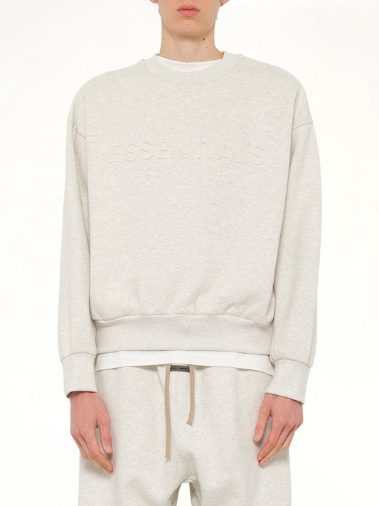 Image of a model wearing Outerwear. Product name - Classic Crewneck Sweatshirt in Beige colour by brand - FEAR OF GOD ESSENTIALS