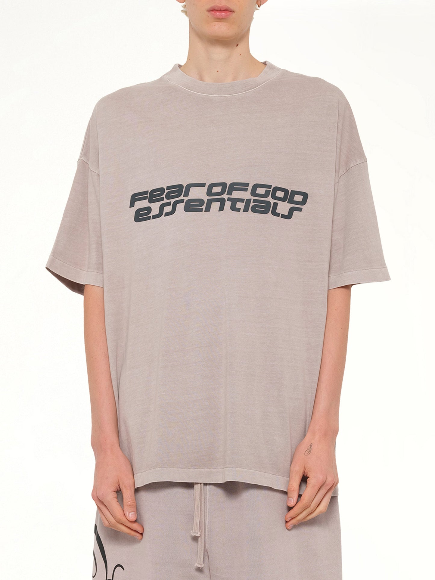 Image of T-Shirts. Product name - "26" T-Shirt in Smoke Grey colour by brand - FEAR OF GOD ESSENTIALS