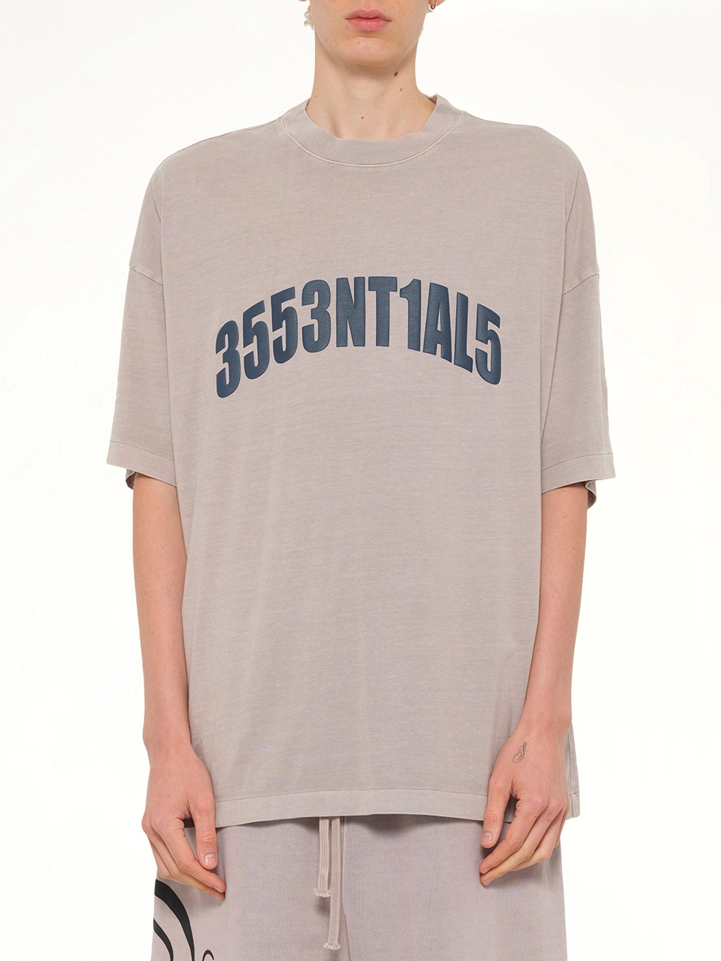 Image of T-Shirts. Product name - 3553NTIAL5 T-Shirt in Smoke Grey colour by brand - FEAR OF GOD ESSENTIALS