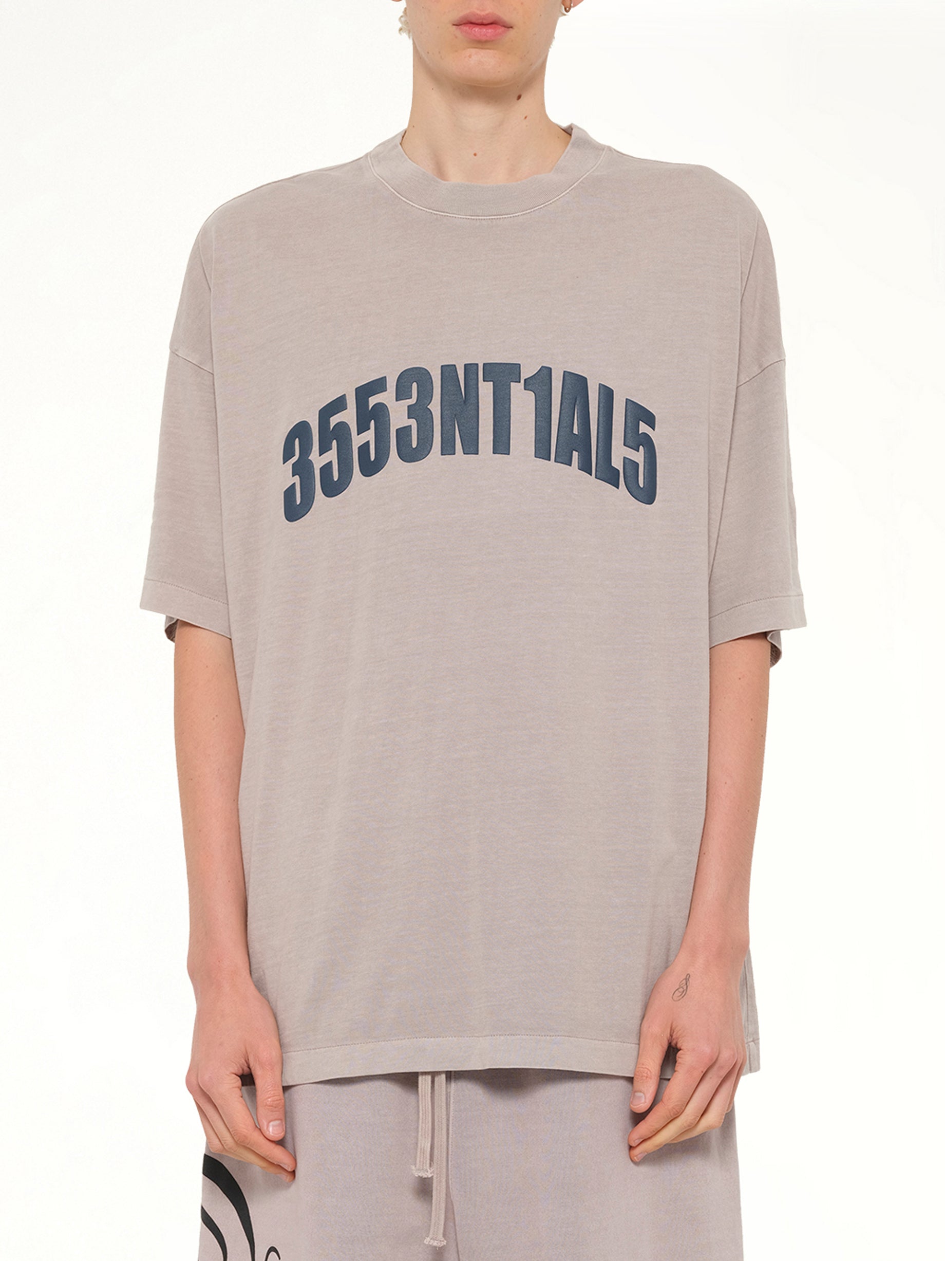 Image of T-Shirts. Product name - 3553NTIAL5 T-Shirt in Smoke Grey colour by brand - FEAR OF GOD ESSENTIALS