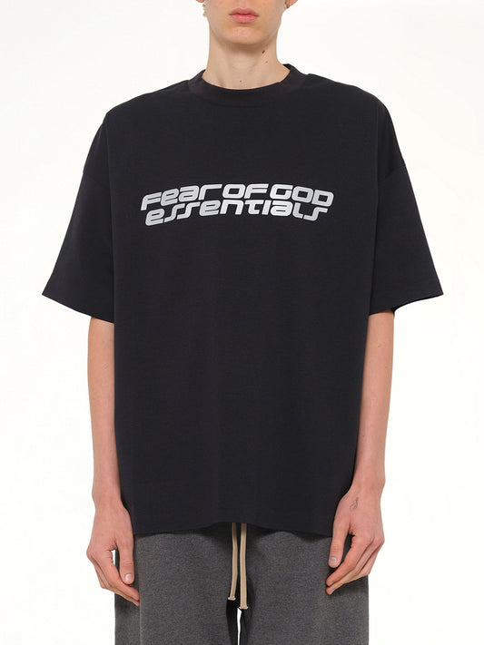 Image of a model wearing Tops. Product name - 90's Short Sleeve T-Shirt in Black colour by brand - FEAR OF GOD ESSENTIALS